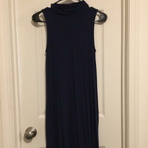 This is a Navy High Neck Alya Dress. Never worn.